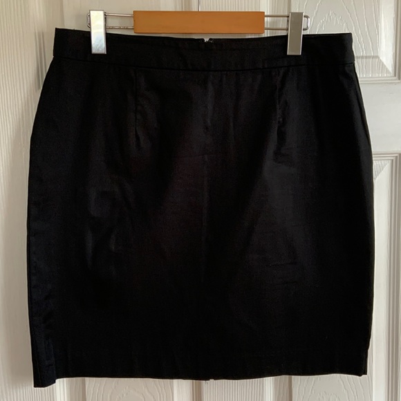 Black cotton skirt. Unlined. Great for office or casual wear. Mint condition. - Picture 1 of 4